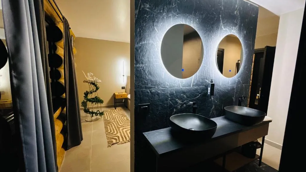 Outdoor dining terrace with mountain views at Rodnei Retreat & Spa Borșa Maramureș